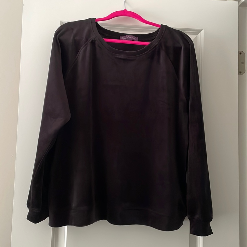 Woman’s velour sweat suit top & bottom.